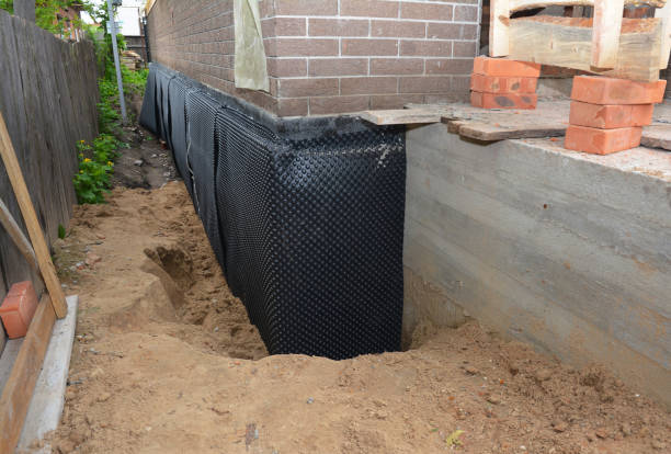 Happy homeowners after waterproofing job in Townsend